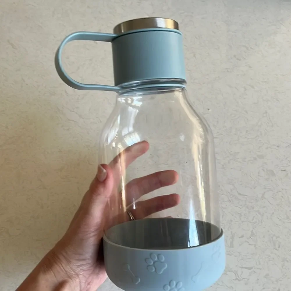Doggie water bottle with detachable base bowl for breaks during long walks